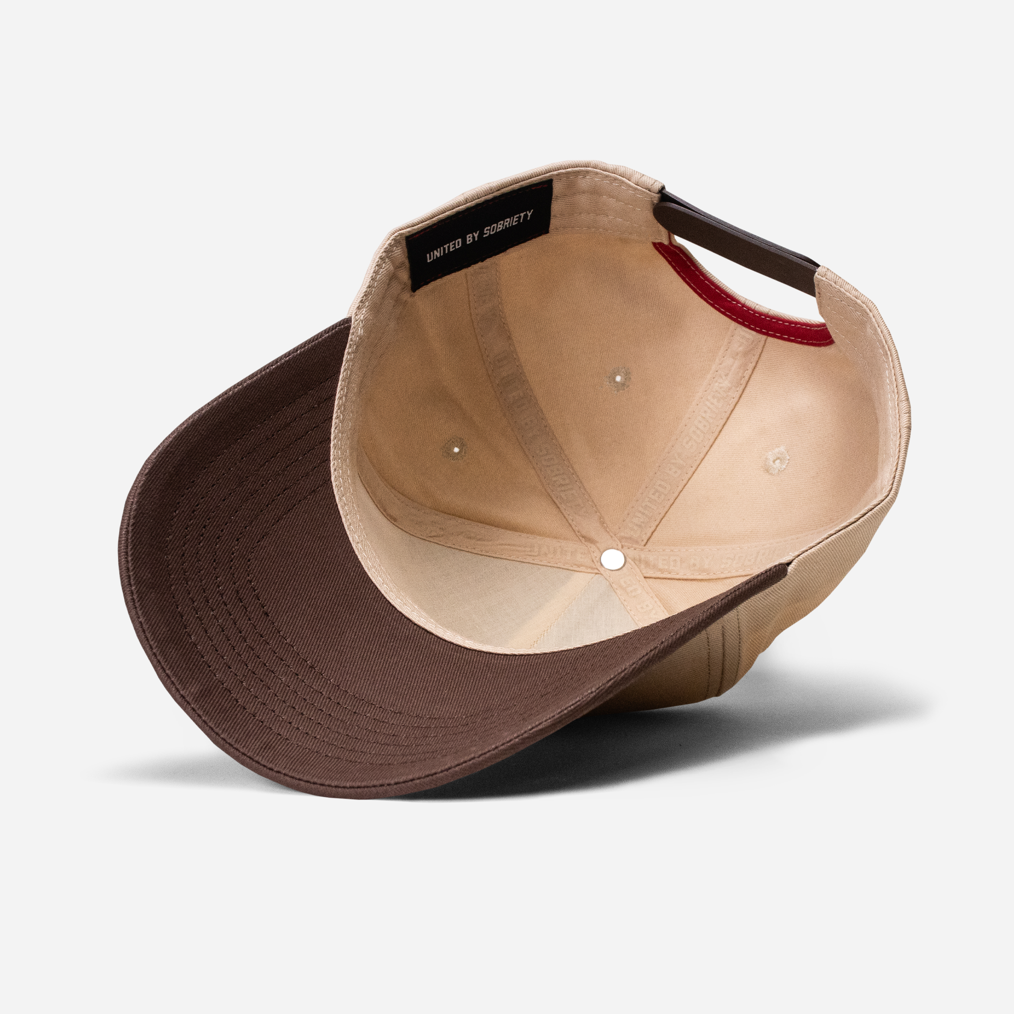 Brown and beige A-Frame cap on a light gray background-United HeadWear