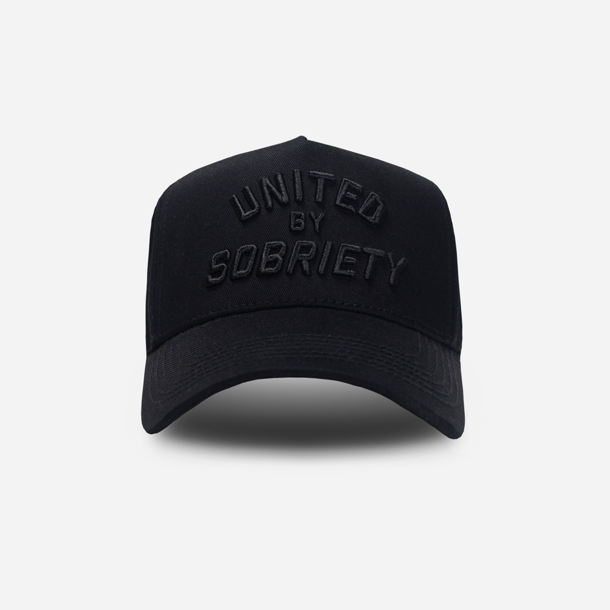 Black A-Frame cap with 'UNITED BY SOBRIETY' -United HeadWear